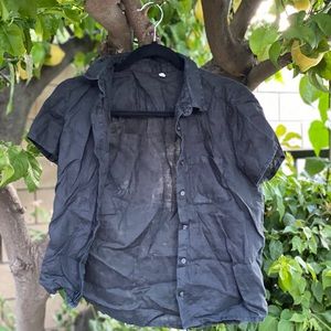 Black button up shirt.